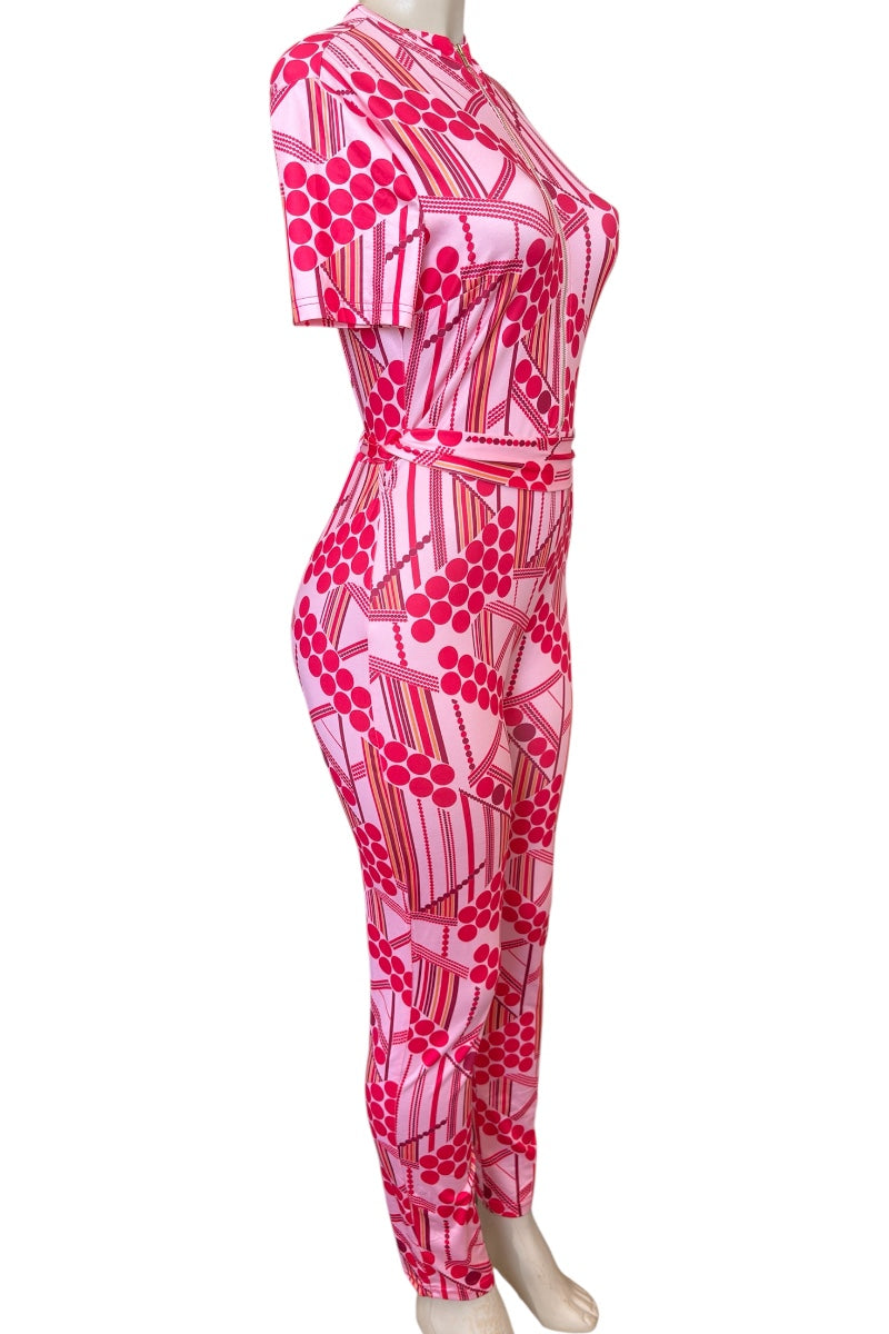 Mannequin wearing a pink patterned outfit on a white background
