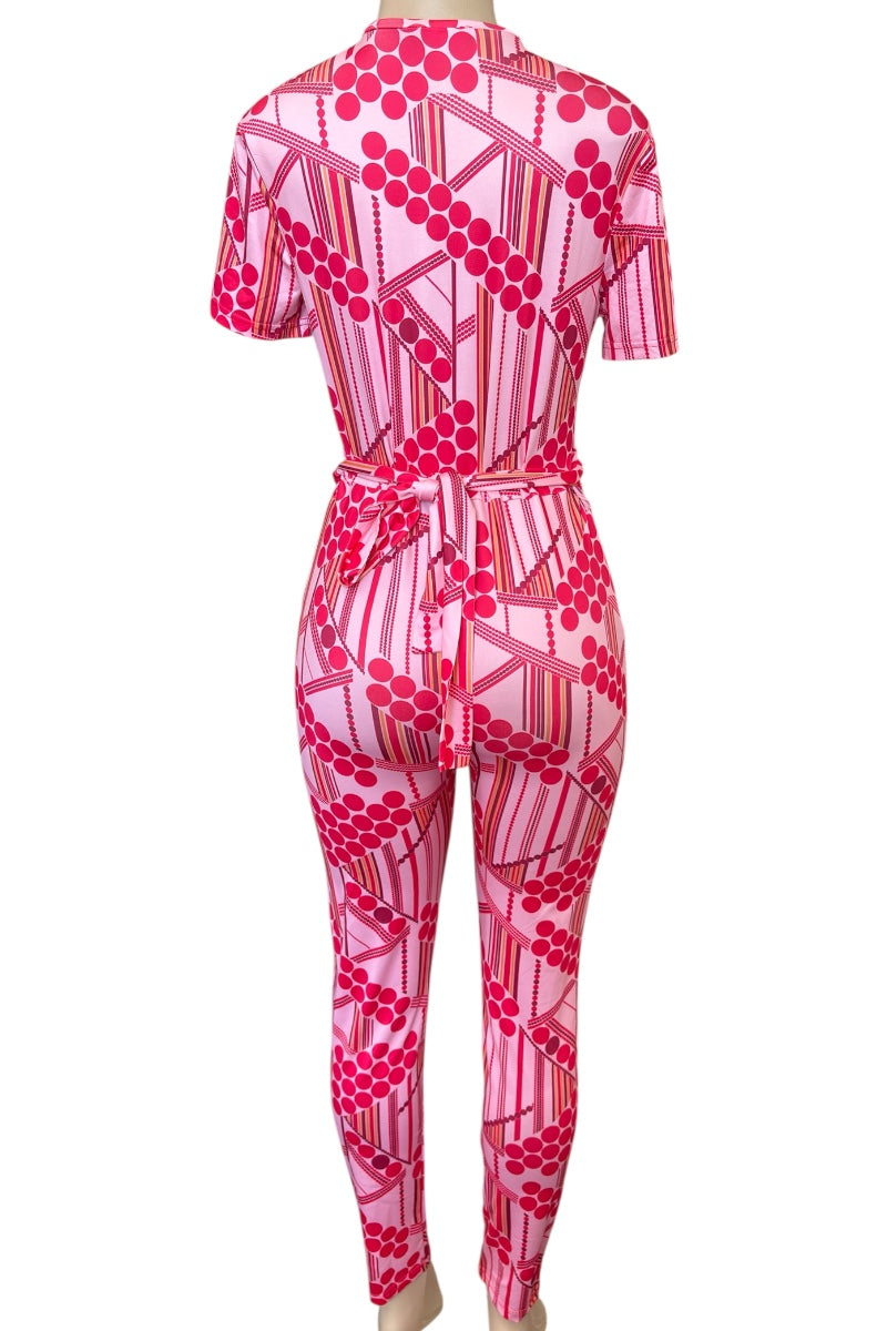 Pink patterned jumpsuit on a white background