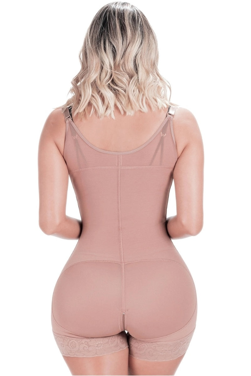 Person wearing a mocha shapewear bodysuit on a white background