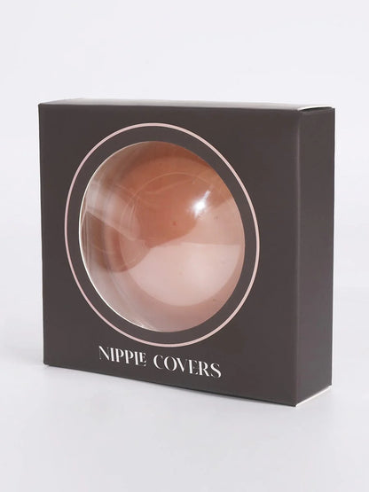 Box of nipple covers with a brown and pink design on a white background