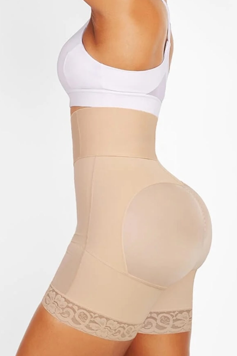 Beige shapewear worn by a person on a white background