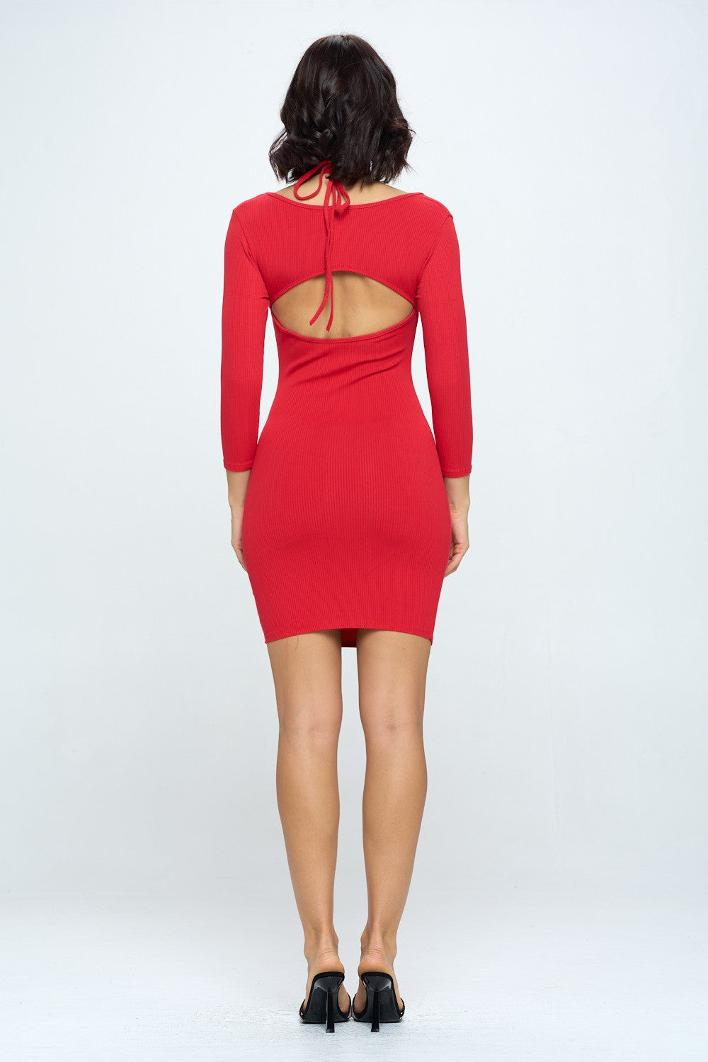 Red dress with cut-out back on a white background