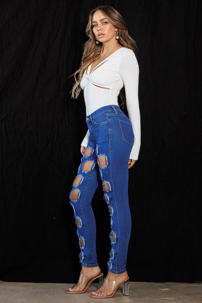 Extra Distressed Skinny Jeans