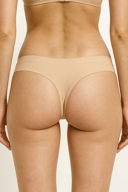 Beige underwear on a plain background