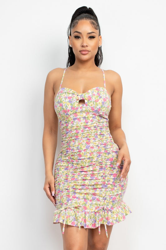 Woman wearing a floral dress on a white background