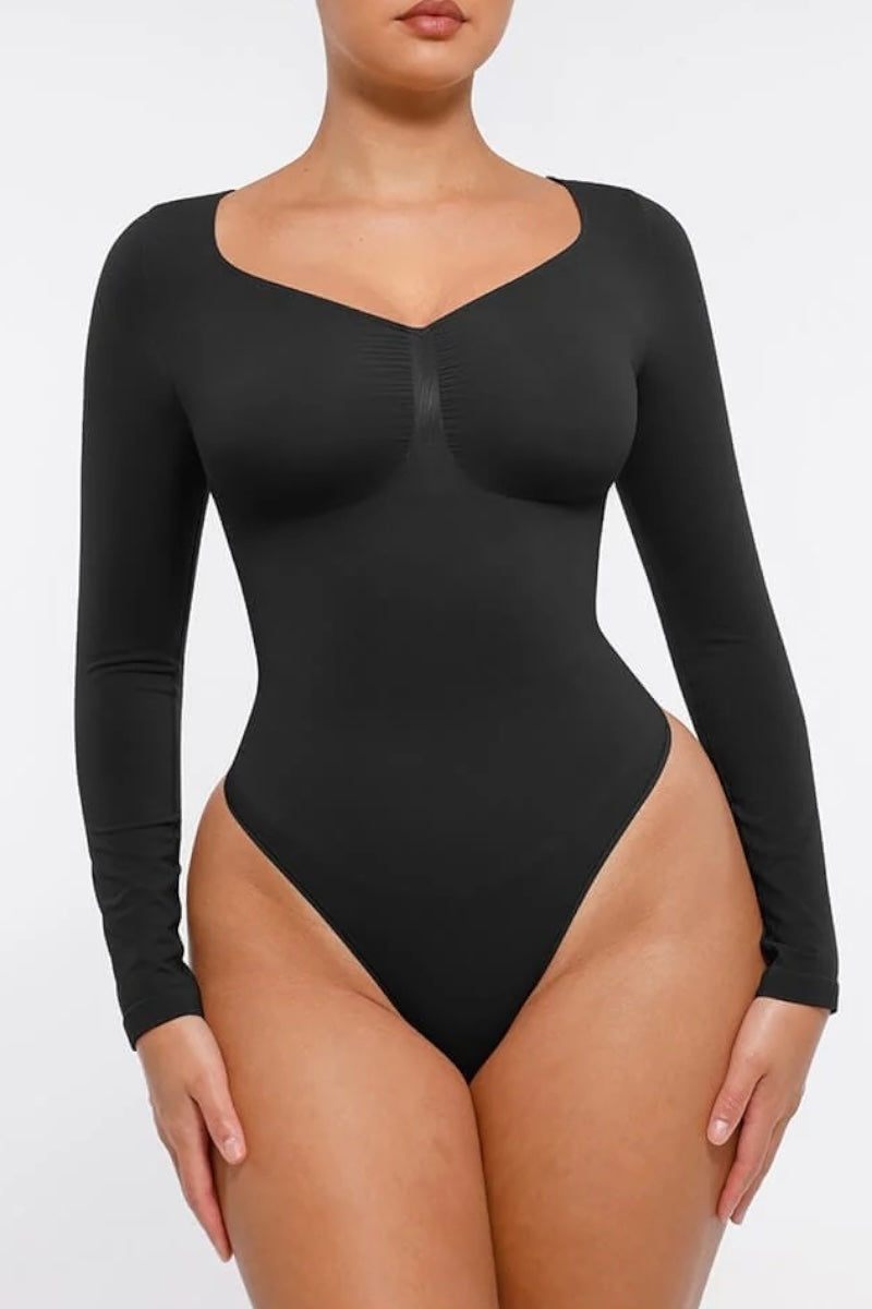 Black bodysuit with long sleeves on a white background