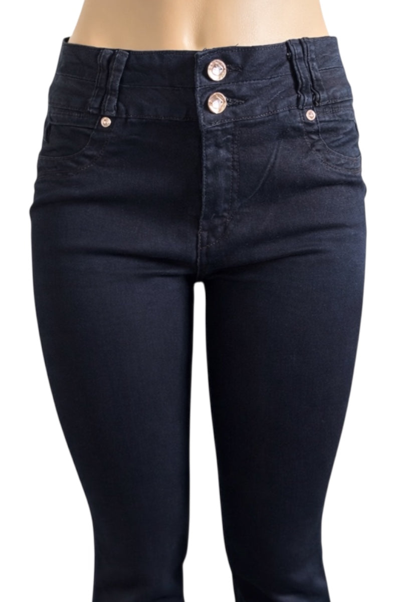 Black jeans with button details on a white background