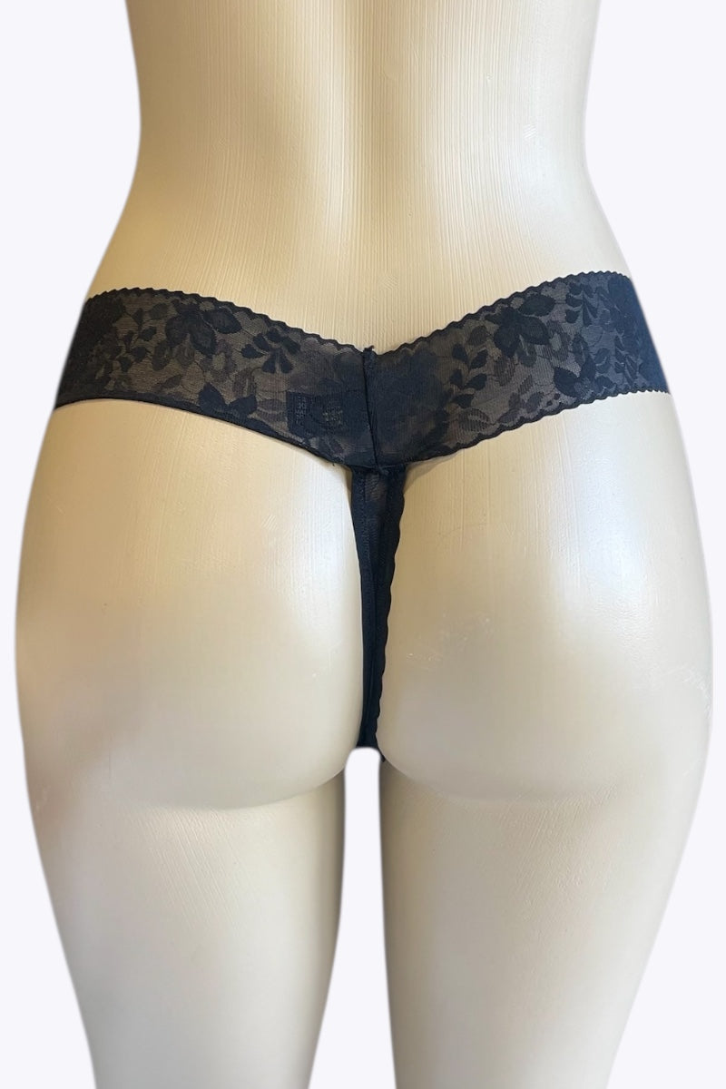 Black lace underwear on a mannequin against a white background