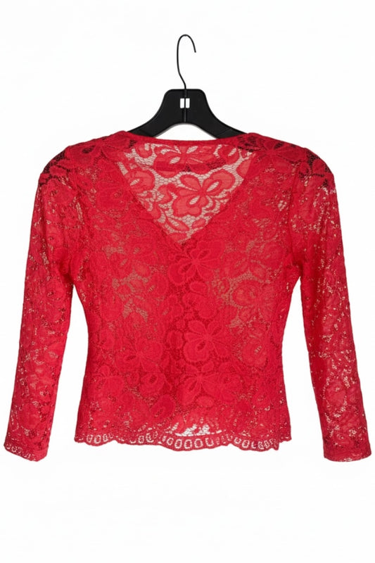 Red lace top on a hanger against a white background