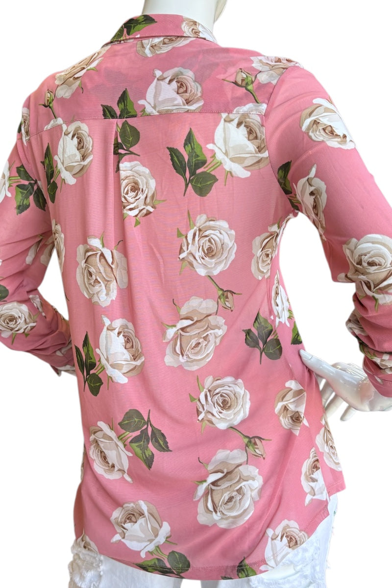 Pink floral long-sleeve shirt on a mannequin with a white background