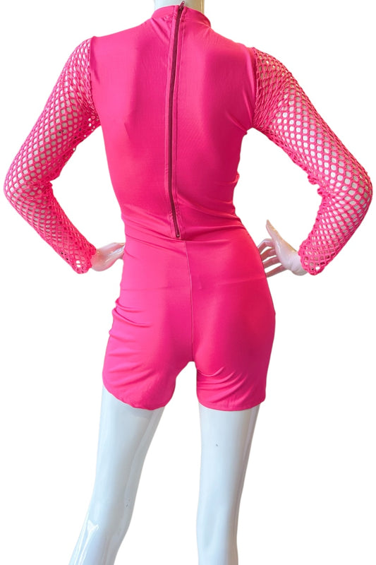 A bright pink one-piece jumpsuit with long fishnet sleeves, shown from the back on a white mannequin against a white background.