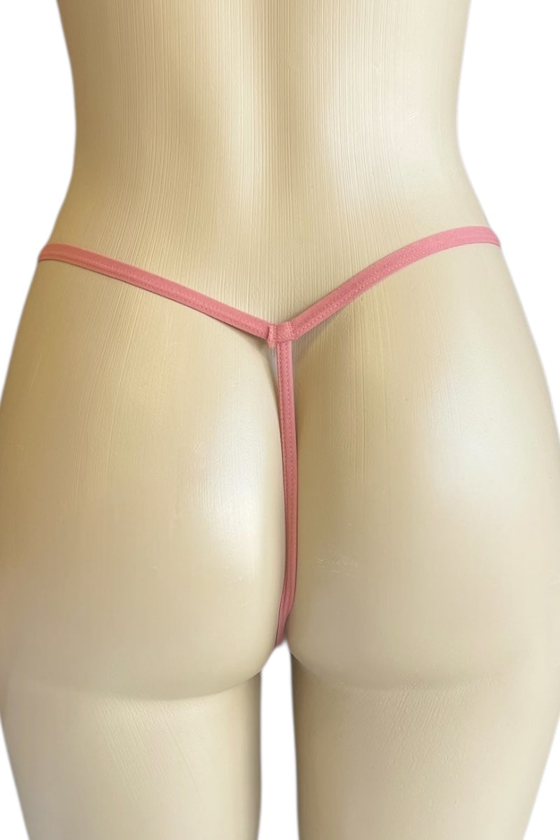Mannequin wearing a pink thong on a white background
