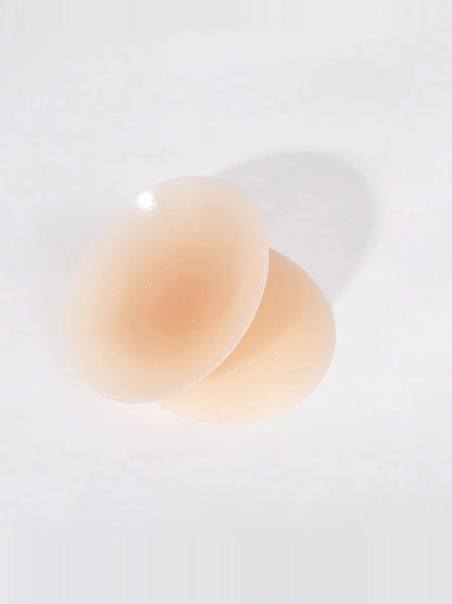 Close-up of a beige silicone cup on a white background