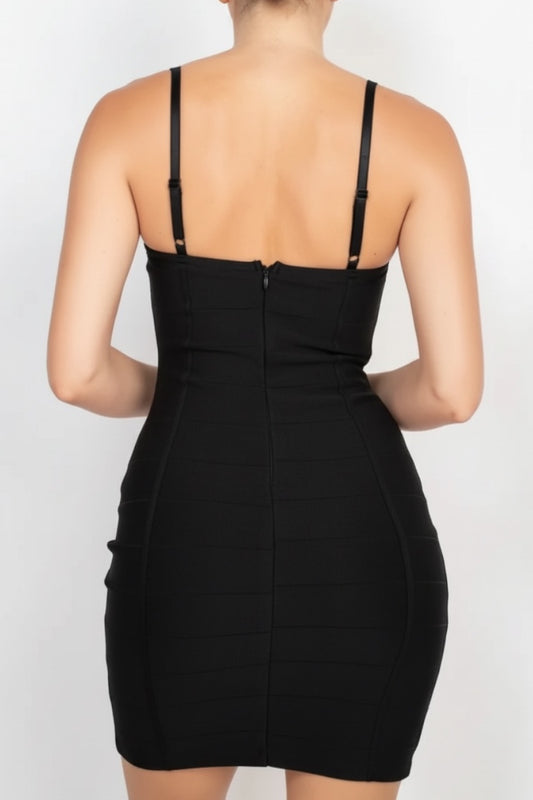 Black dress with thin straps on a white background