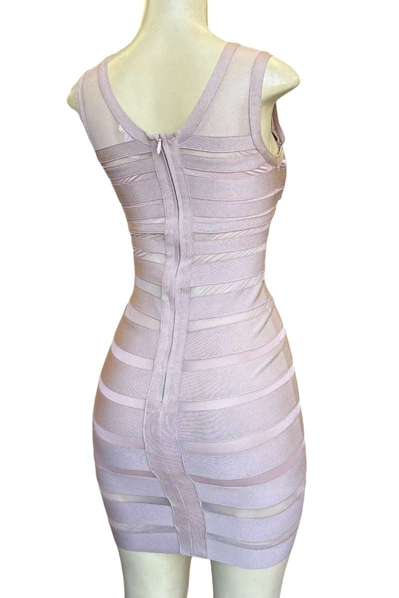 Mauve bandage dress on a mannequin against a white background