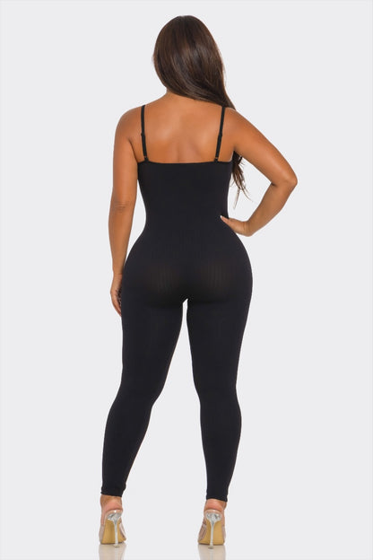 Black bodysuit worn by a model on a white background
