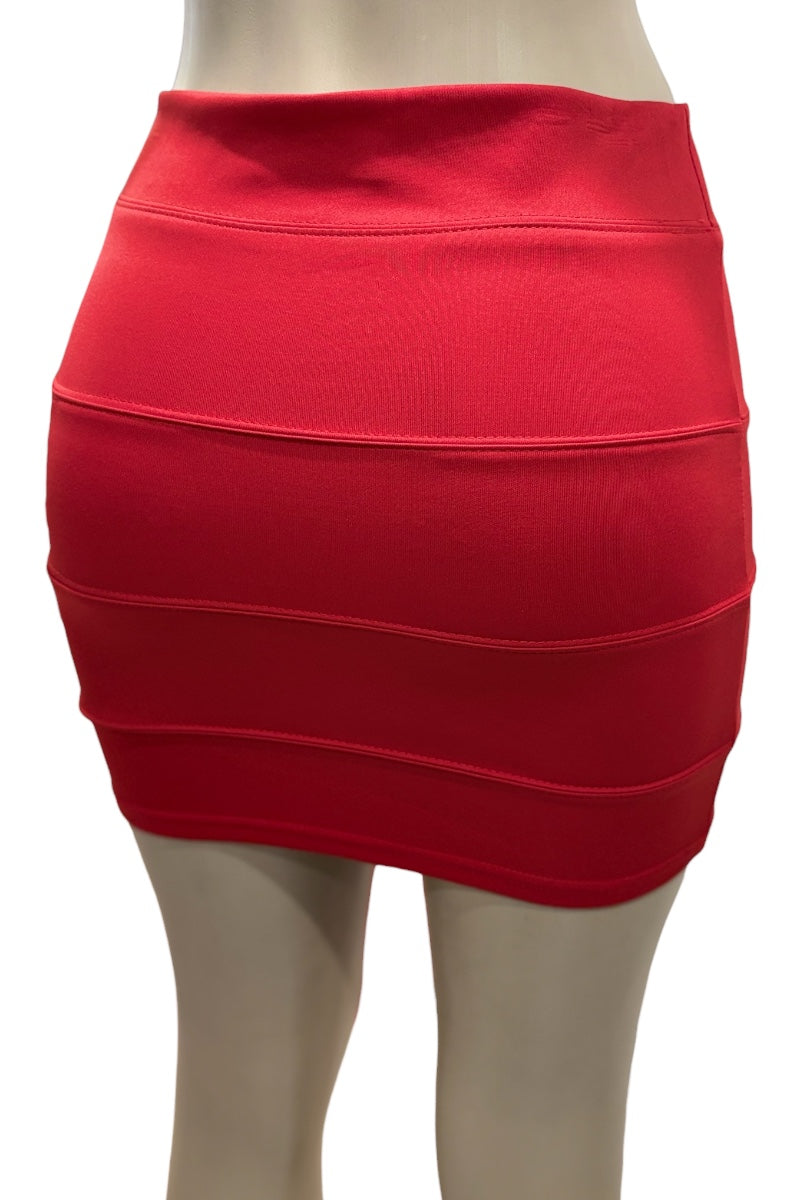 Red skirt on a mannequin against a white background