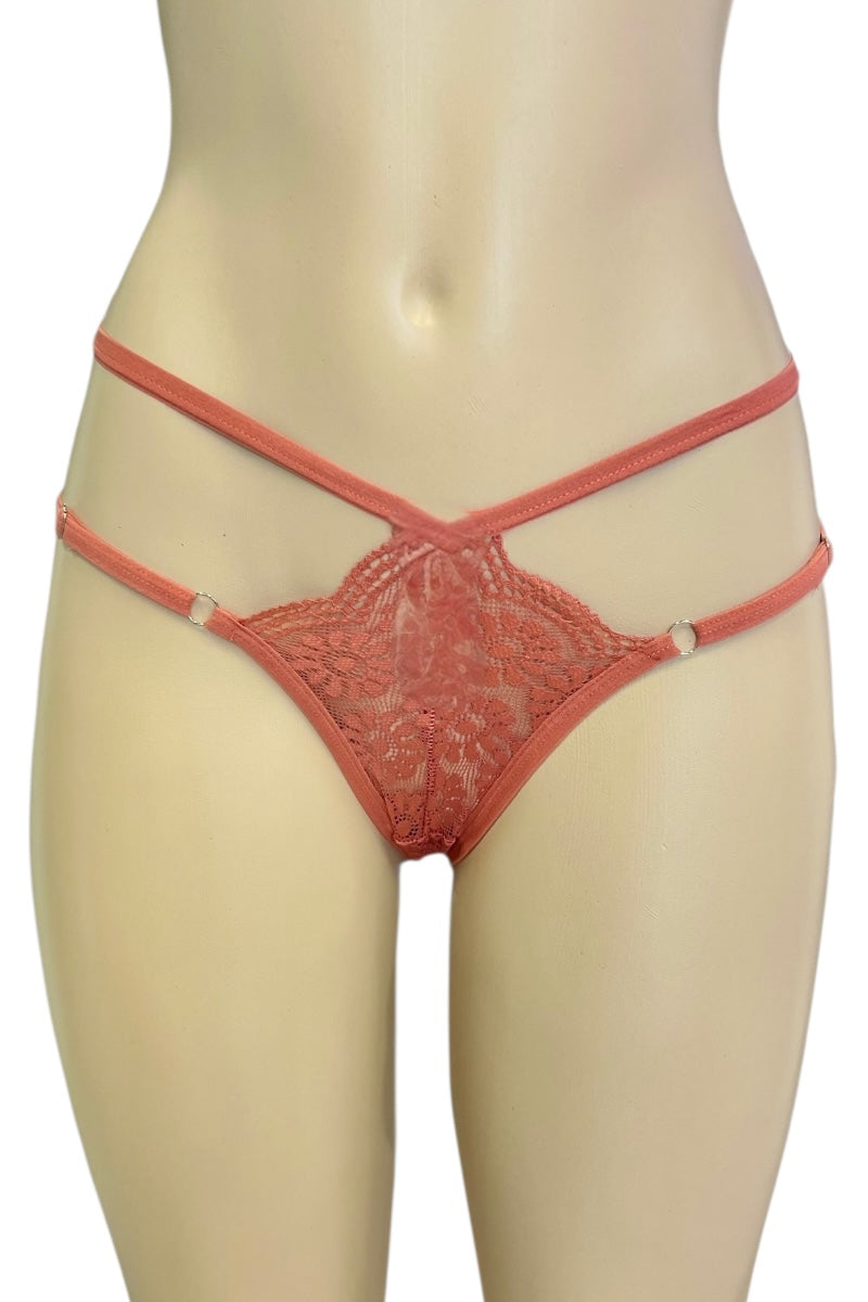 rust lace thong on a mannequin against a white background