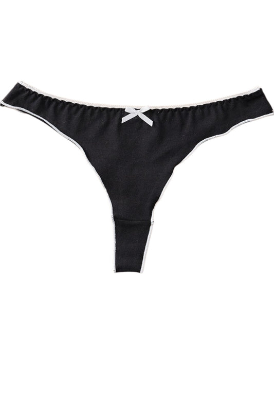 Black thong underwear with white trim and a small white bow at the center front, shown flat against a white background.