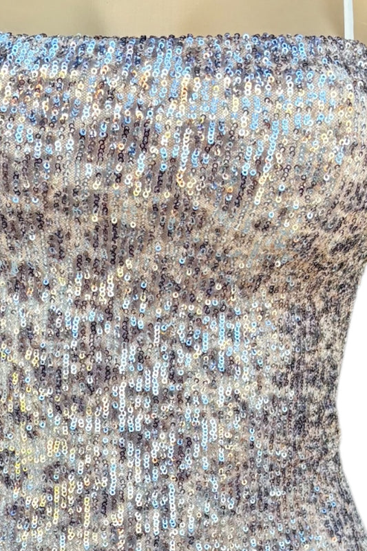 Close-up of a dress top with a gradient of colors.