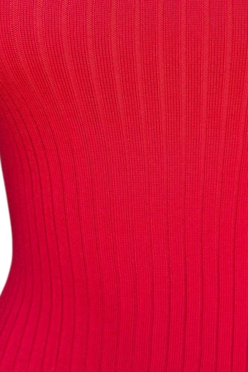 Close-up of a red ribbed fabric texture
