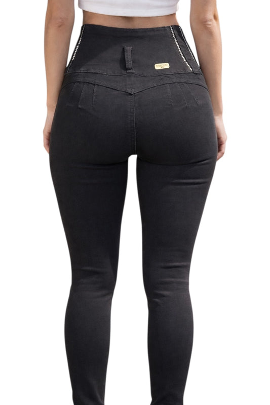 Black pants worn by a person on a white background