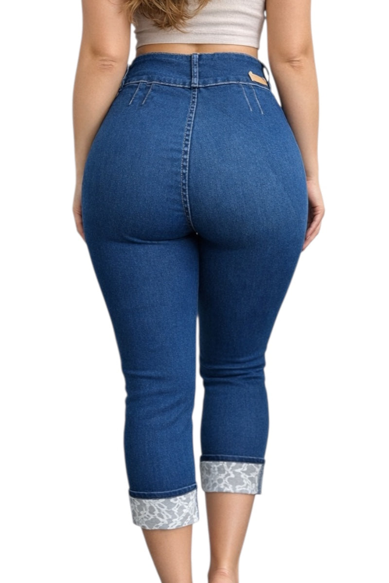 Blue jeans with lace cuffs on a white background