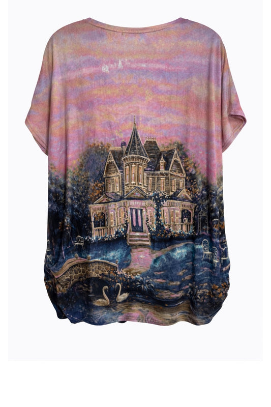 T-shirt with a printed design of a house and swans on a landscape.