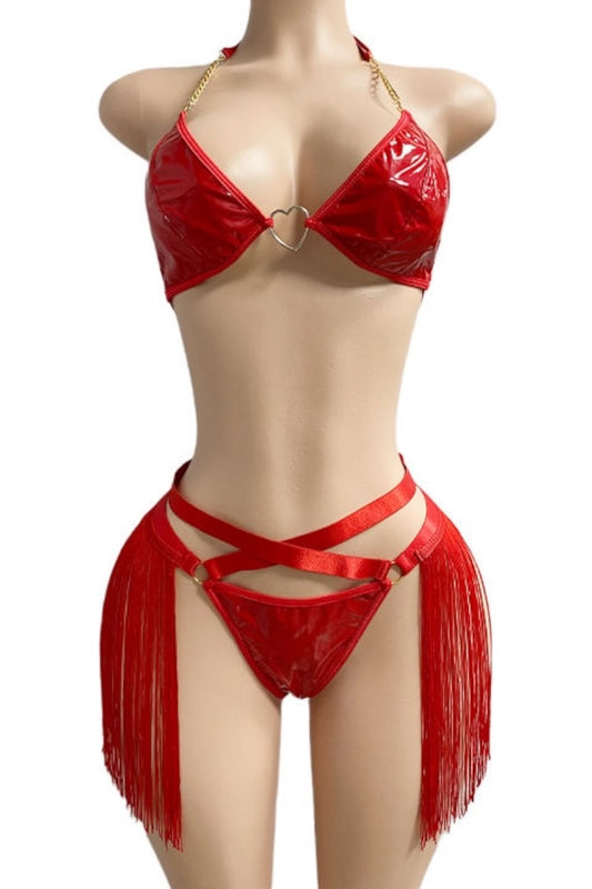 Red lingerie set with fringes on a mannequin against a white background