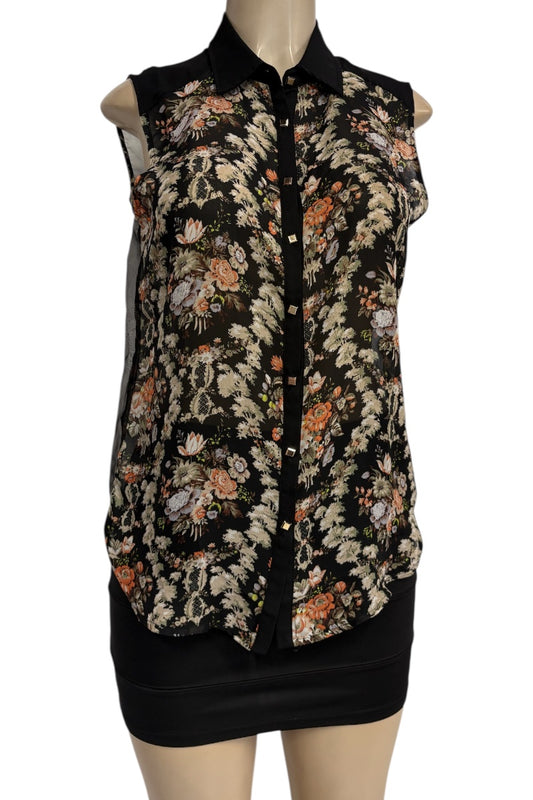 Floral patterned sleeveless top on a mannequin against a white background