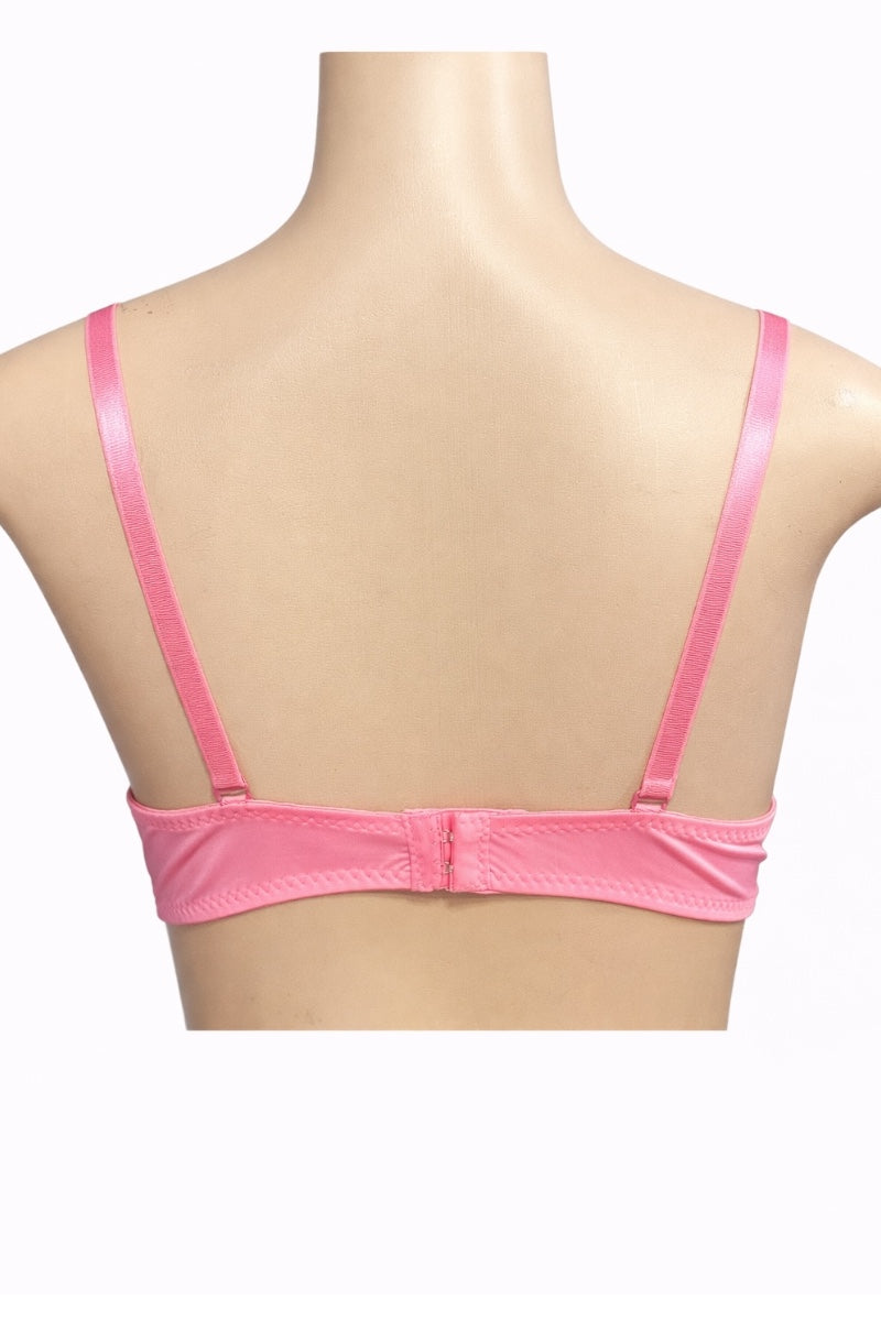 Pink bra on a mannequin with a white background