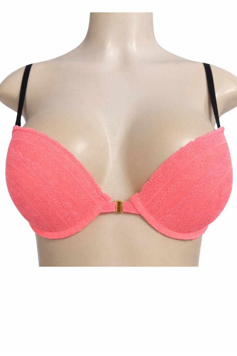 coral bra on a mannequin with a white background