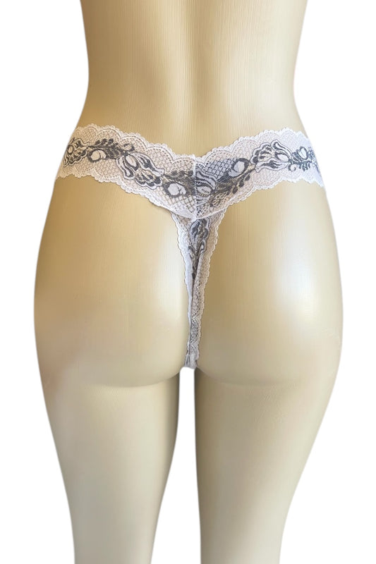 Lace thong on a mannequin against a white background