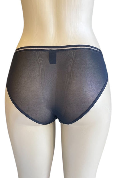 Sheer black underwear on a mannequin against a white background