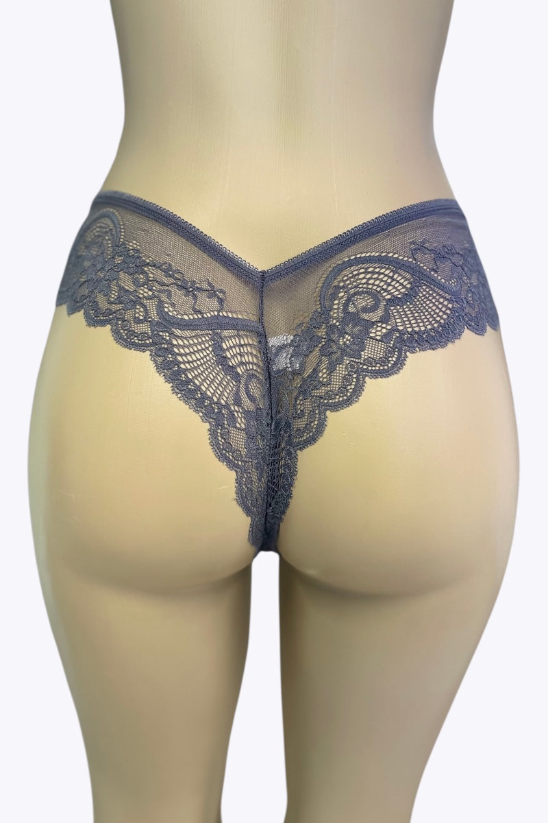 Mannequin wearing a pair of blue lace lingerie on a white background