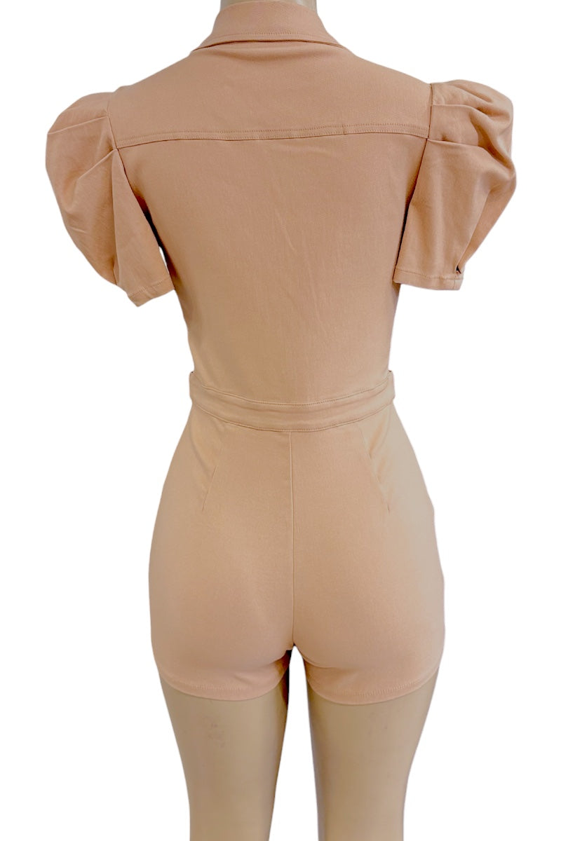 A beige-colored short romper with puff sleeves, shown from the back on a mannequin against a white background.