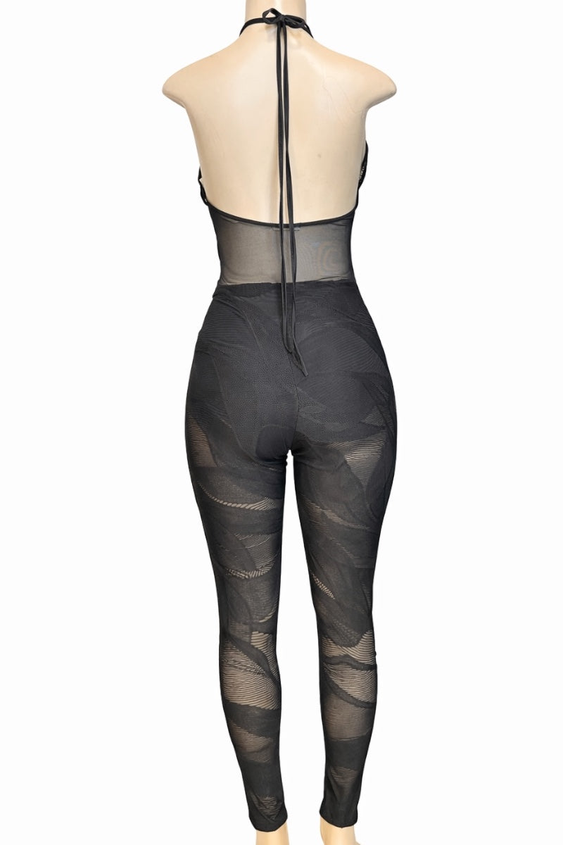 Black sheer jumpsuit on a mannequin against a white background