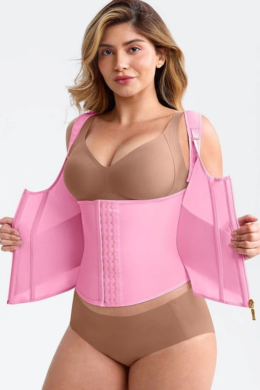Woman wearing a pink waist trainer with a white background