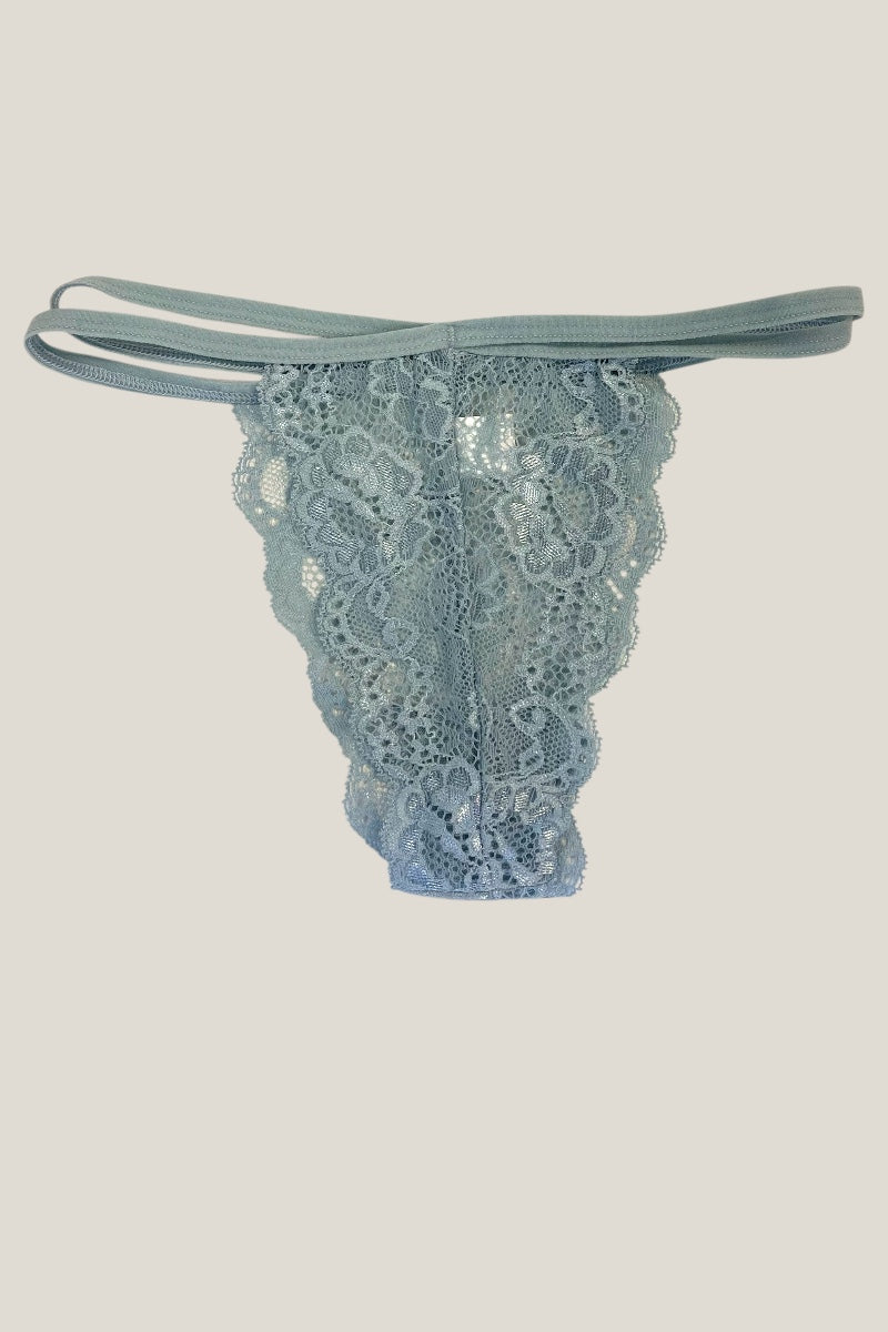 Light blue lace thong on a light gray background