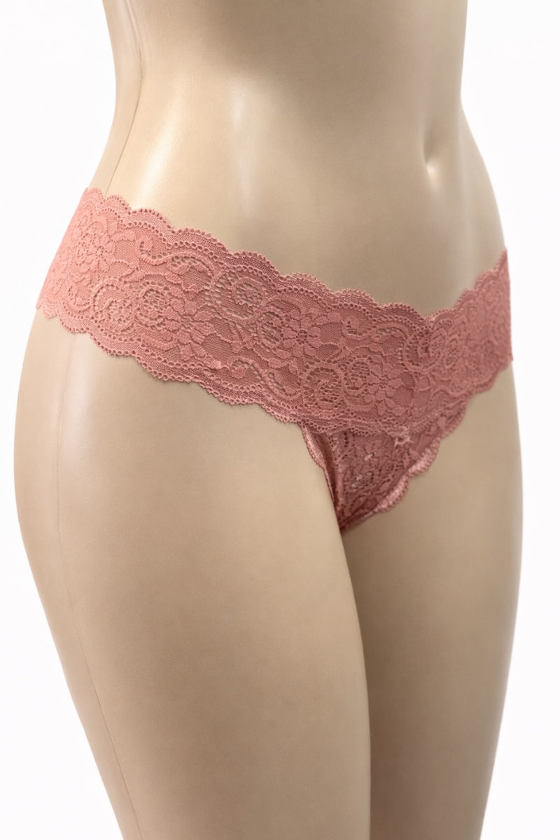 Mauve Glow Pink lace thong on a mannequin against a white background