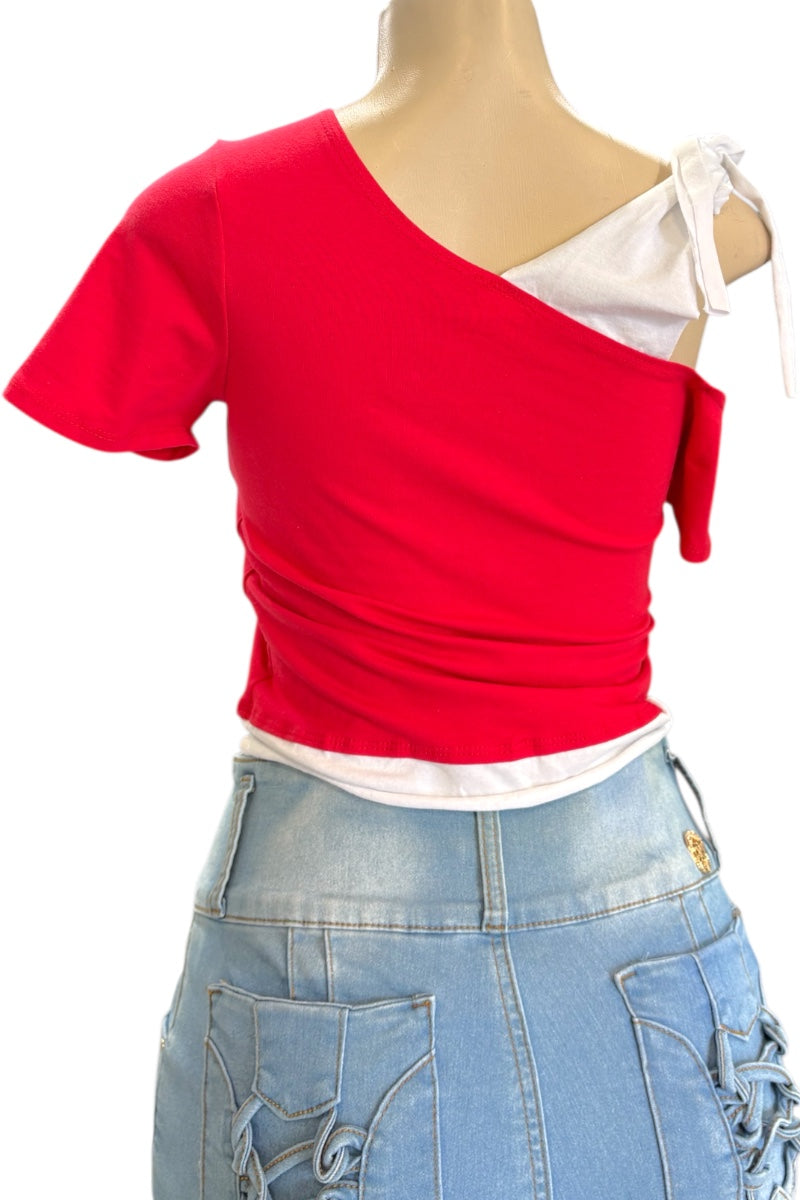 Red and white off-shoulder top worn by a mannequin on a white background