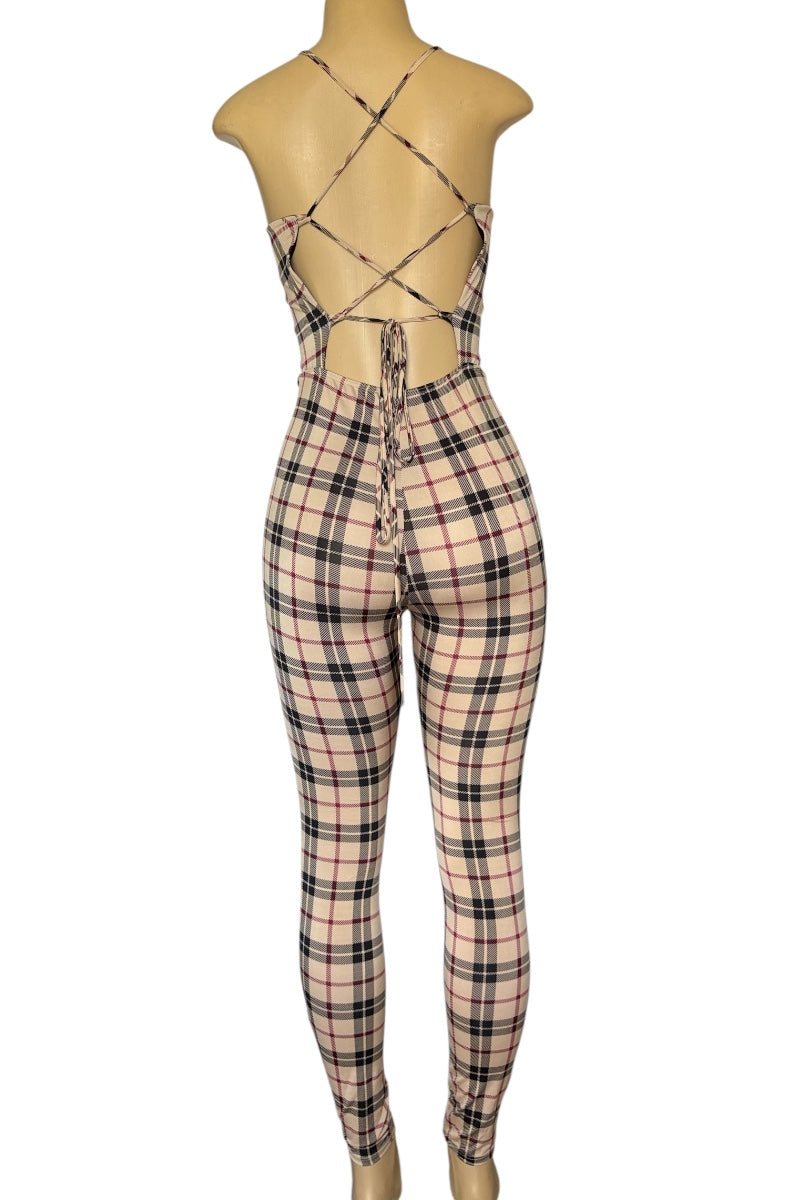 Plaid jumpsuit on a mannequin against a white background