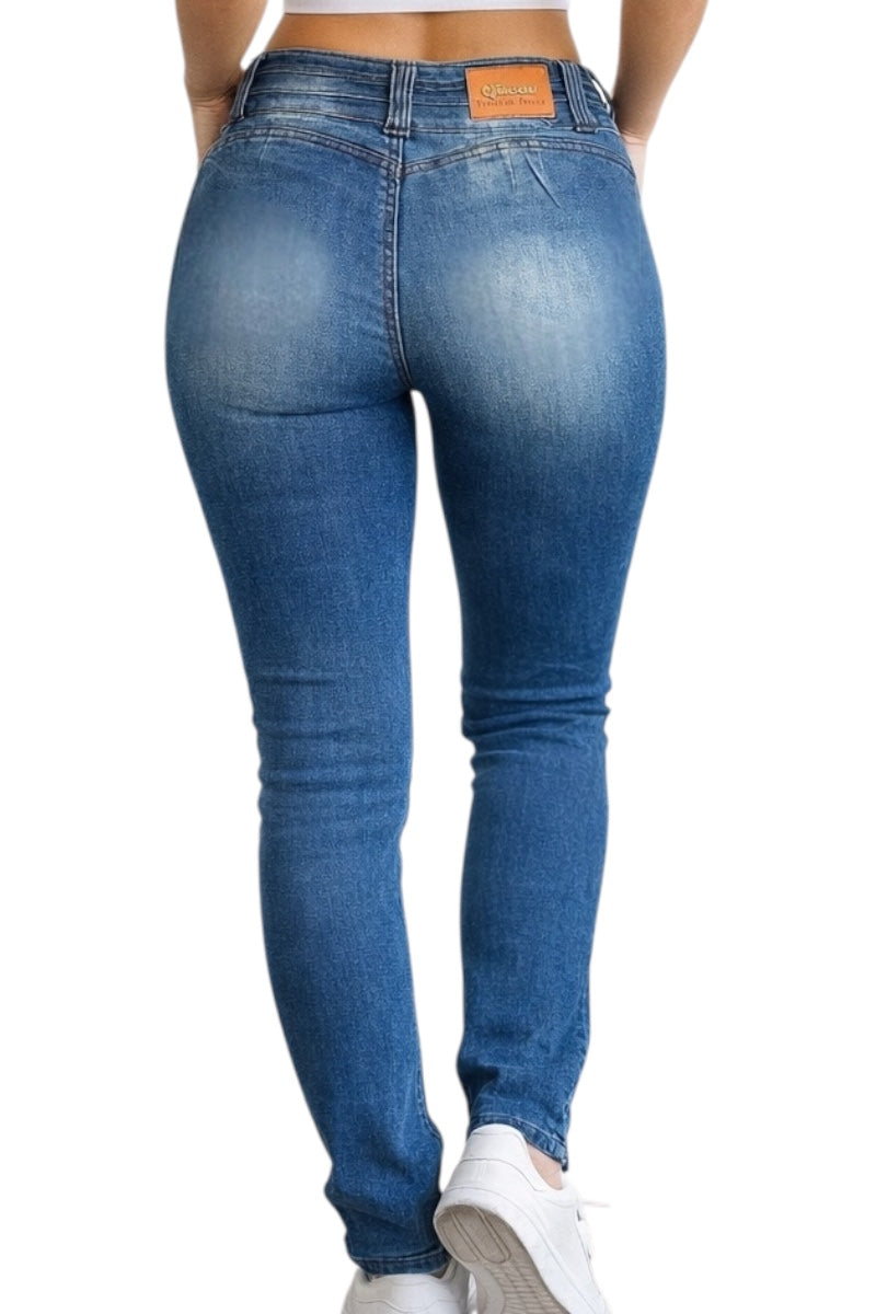 Blue jeans worn by a person on a white background