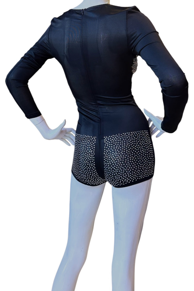Black long-sleeve romper with rhinestone-covered back and shorts, shown on a white mannequin from the back.