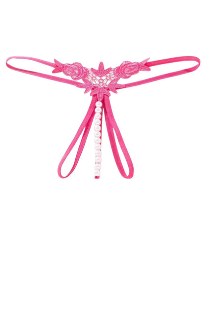 A bright hot pink lace thong with a decorative floral lace top, thin elastic side straps, and a dangling beads, shown on a plain white background.