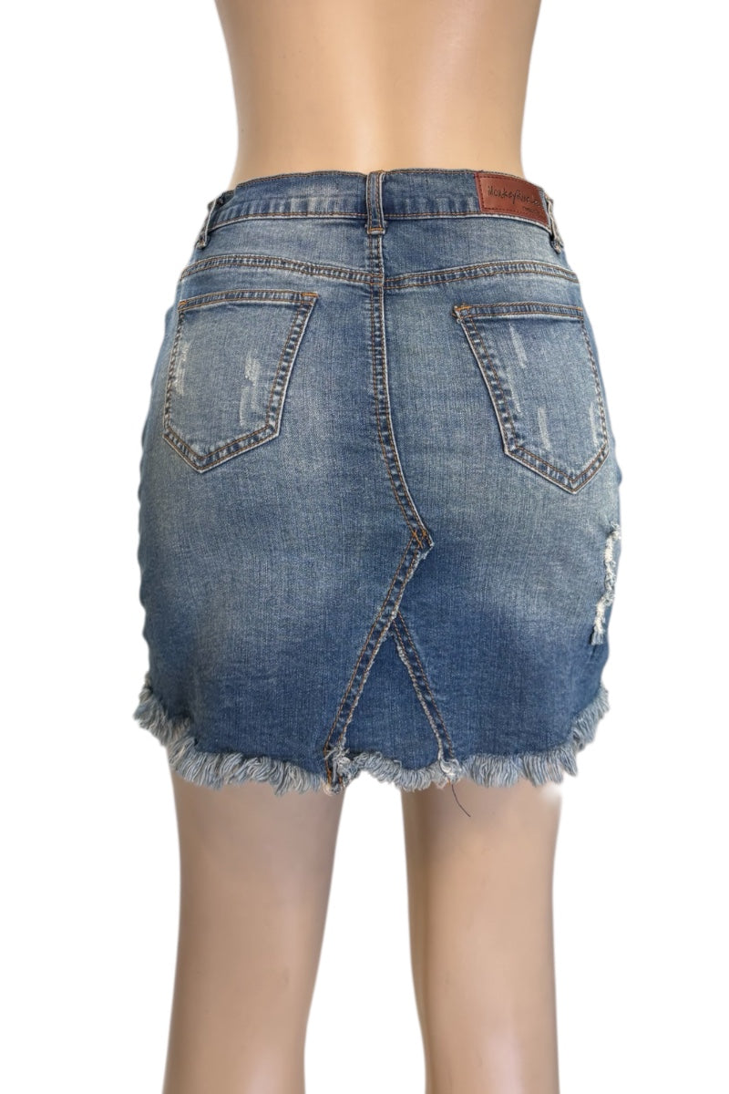 Denim skirt on a mannequin with a white background