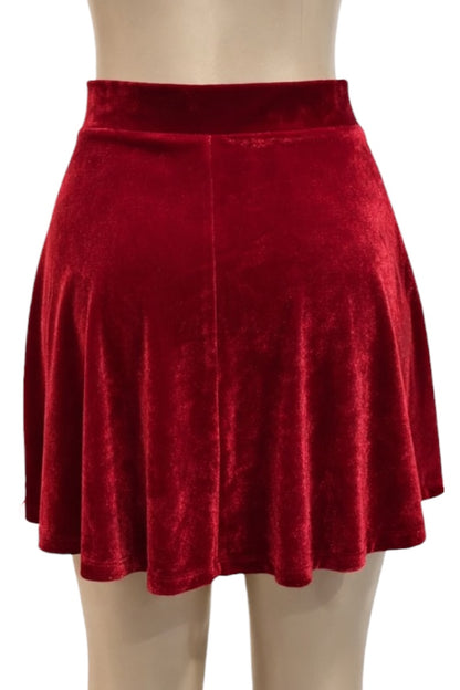 Red velvet skirt on a mannequin with a white background