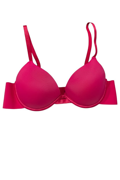 Pink bra on a white background