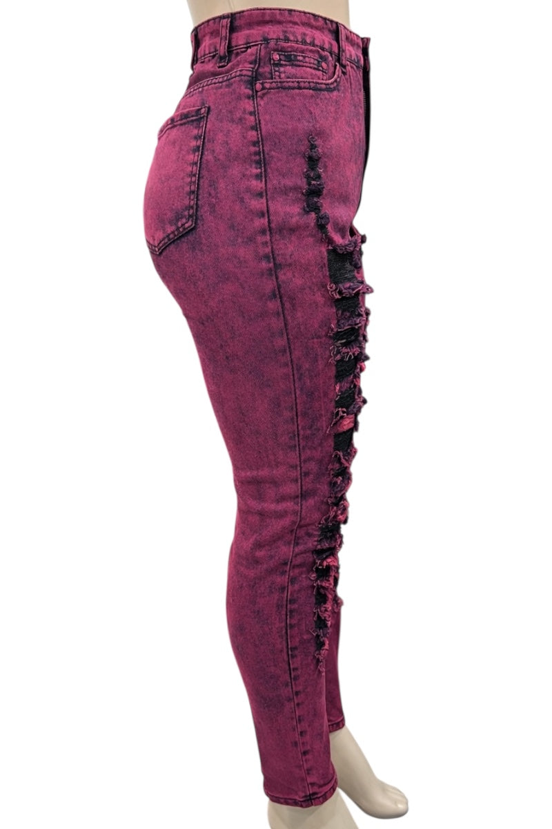 red distressed jeans on a white background