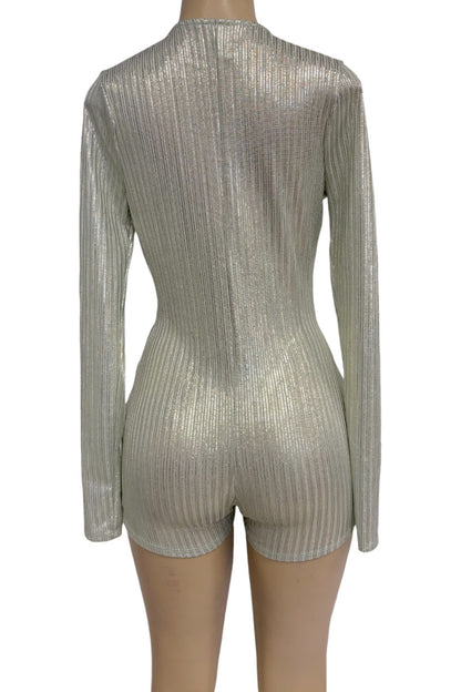 A metallic  ribbed long-sleeve romper with matching shorts, shown from the back on a mannequin against a white background.